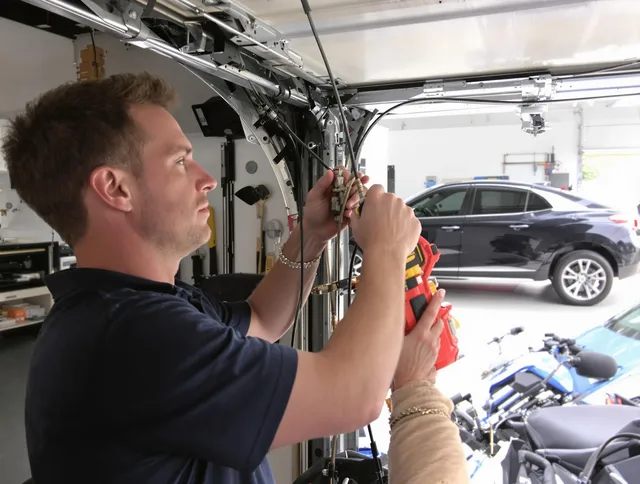 Rocky Hill Garage Door Repair safety certified technician performing cable replacement in Rocky Hill