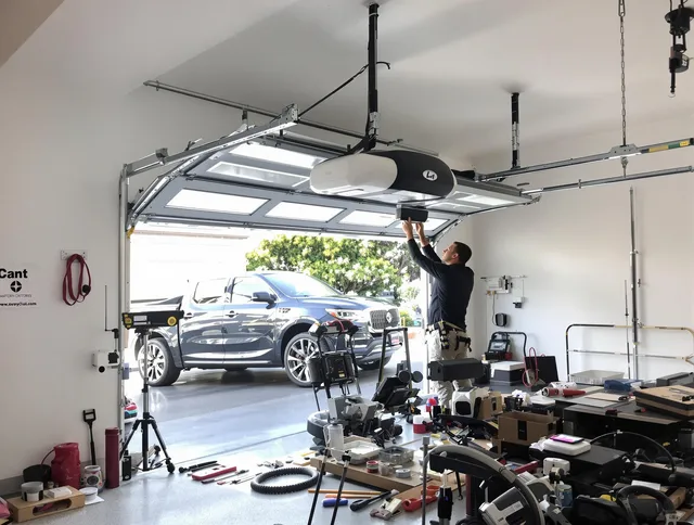 Rocky Hill Garage Door Repair specialist installing smart garage door opener system in Rocky Hill home