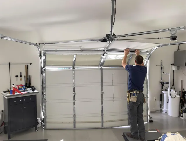 Rocky Hill Garage Door Repair specialist performing precise section replacement on Rocky Hill garage door